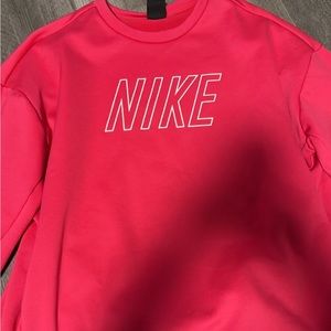 Pink Nike sweatshirt
